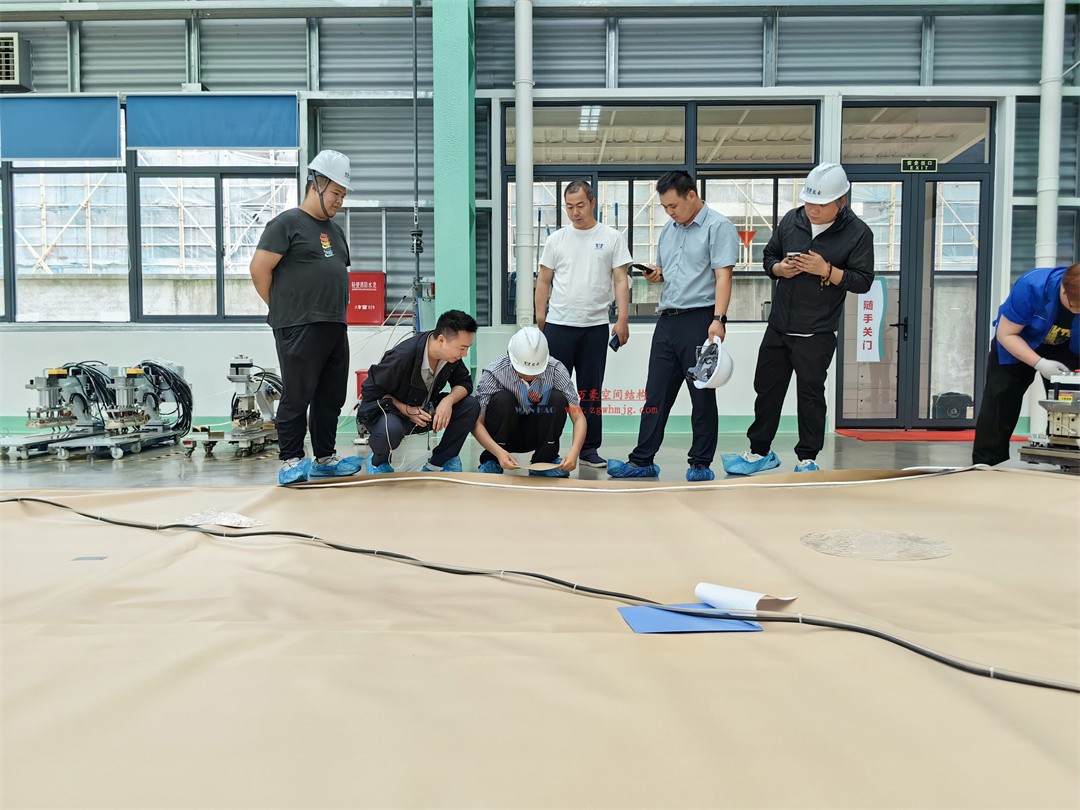 科技賦能品質工程 | 萬豪集團攜手浙大團隊圓滿完成無錫奧體中心膜結構排水試驗驗收